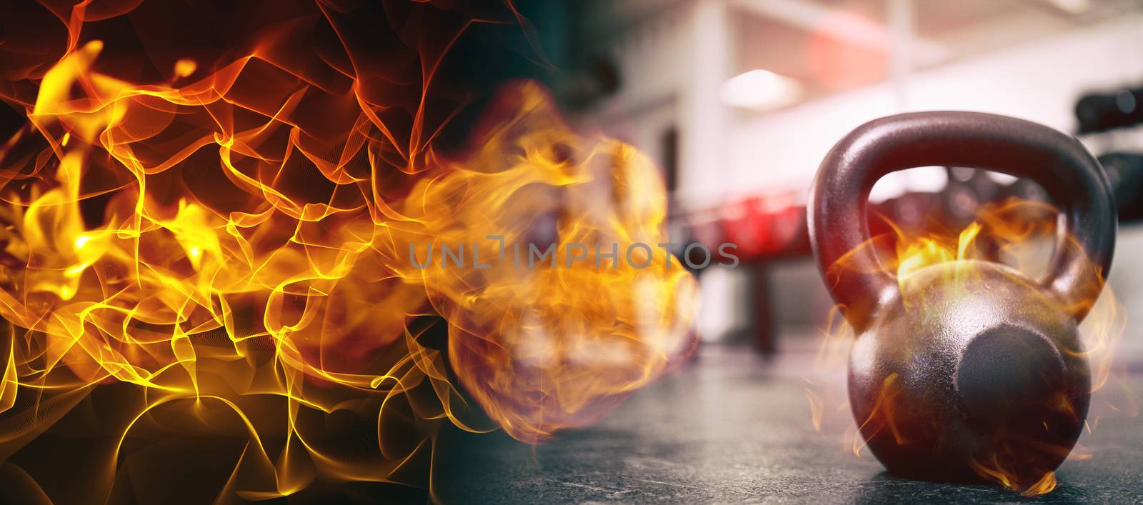 Abstract orange glowing black background against kettlebell in gym