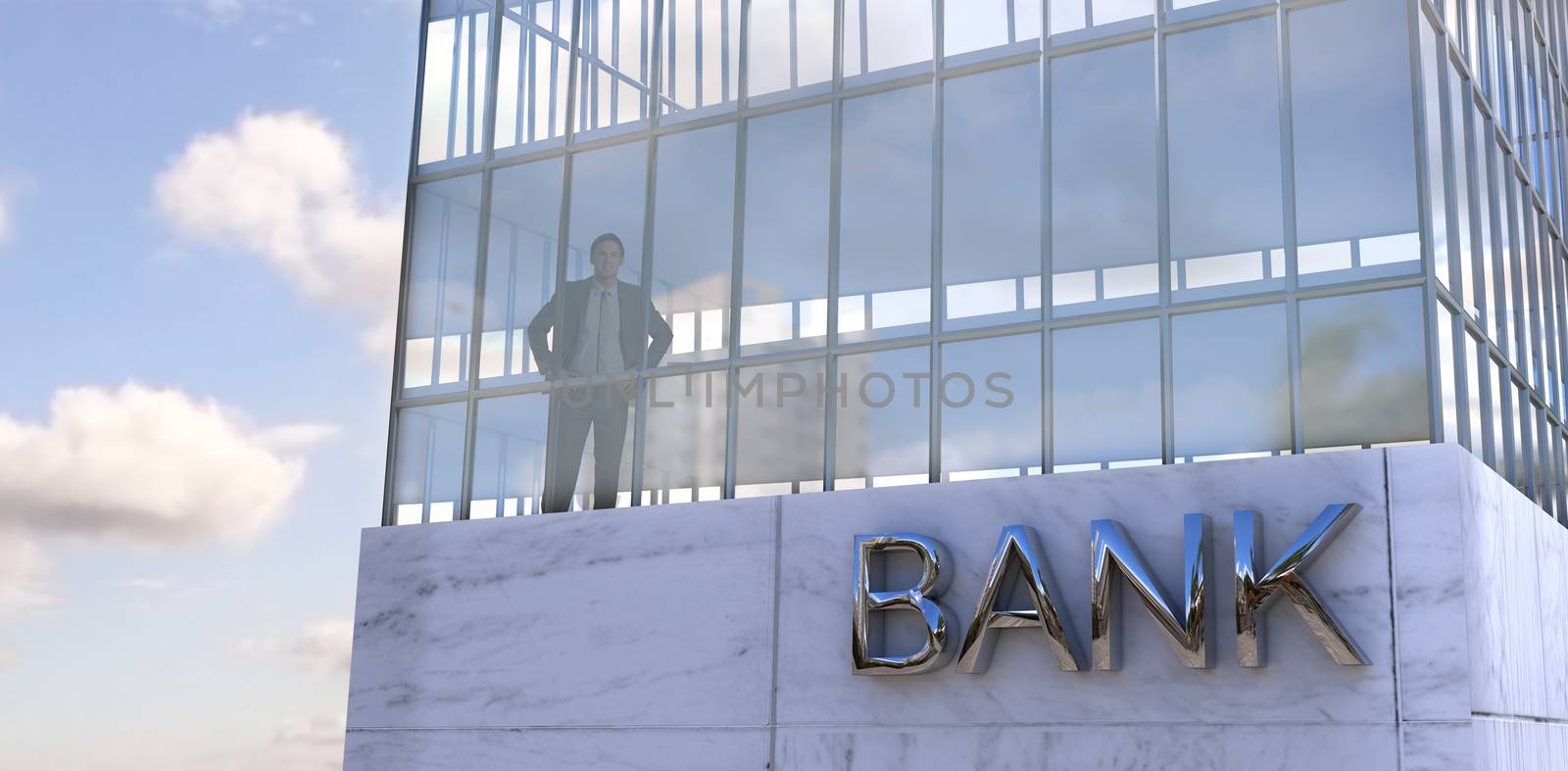 Businessman standing with hands on hips against low angle view of facade of office building