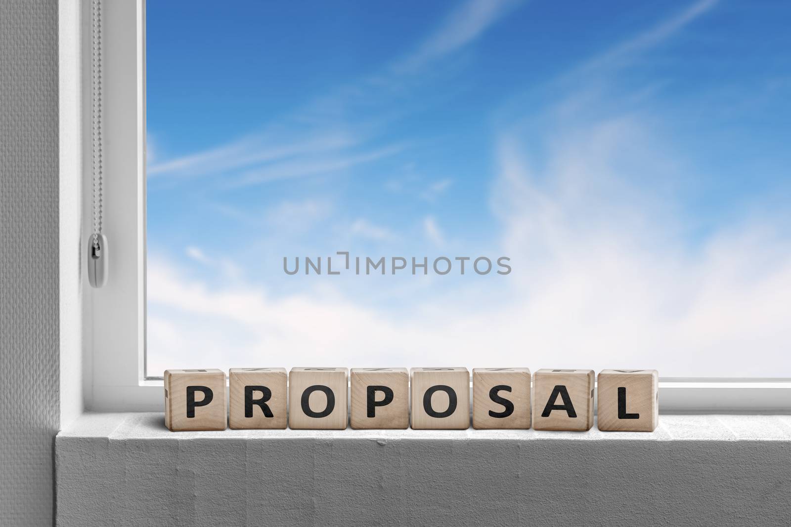Proposal sign in a window with a view to a heavenly blye sky in bright light
