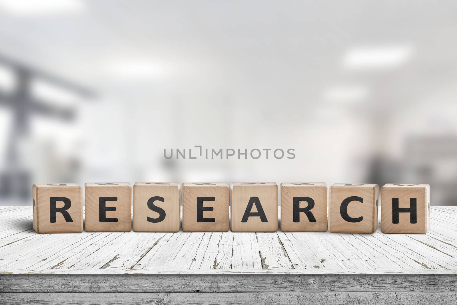 Research sign on a desk made of wood with white paint in a bright lab