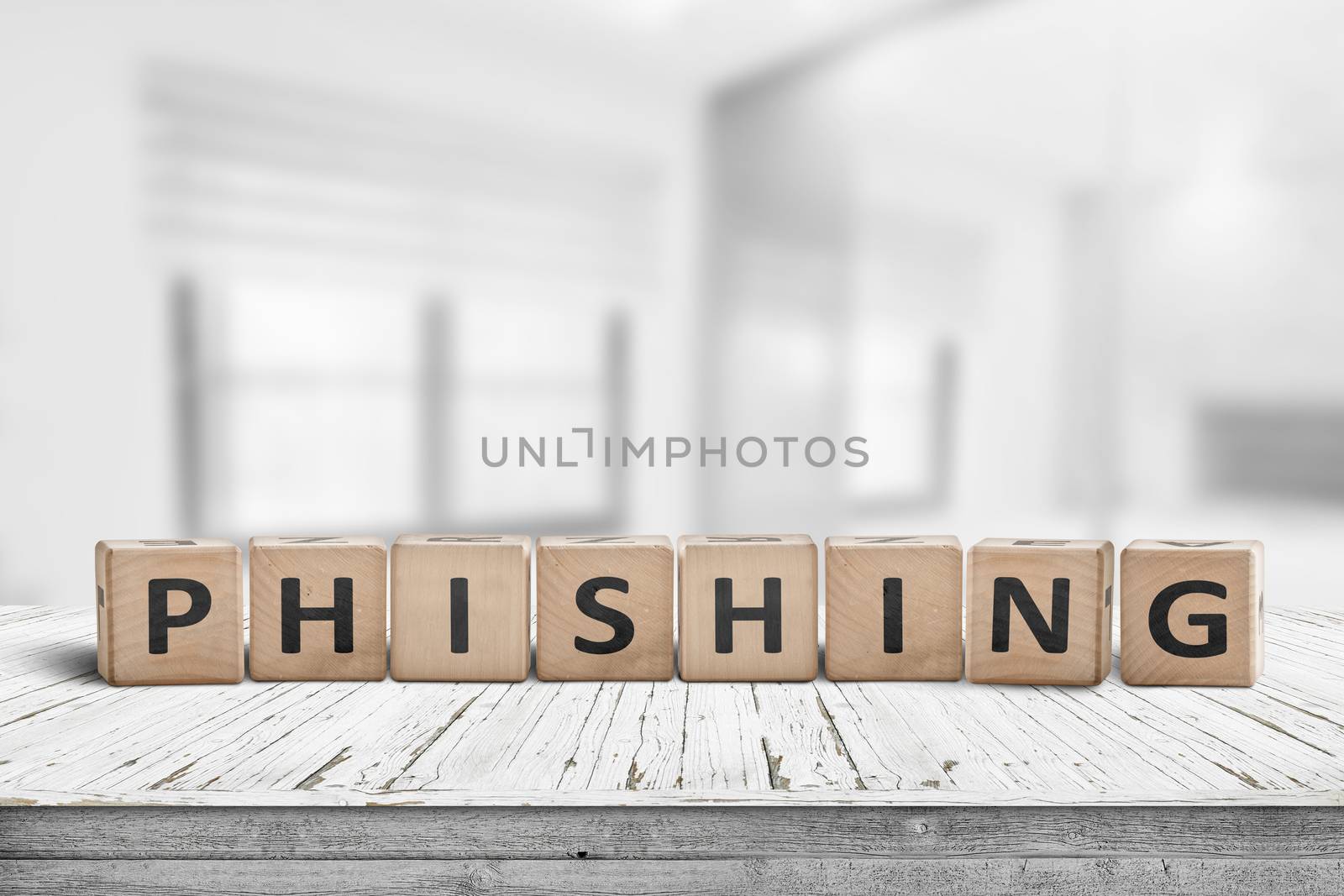 Phishing scam sign on a wooden table in a bright office with blocks