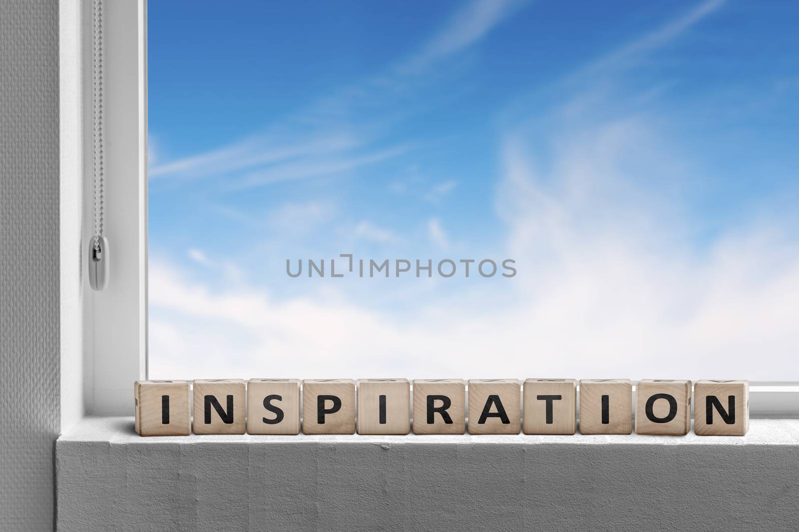 Inspiration message in a windows sill with blue sky outside