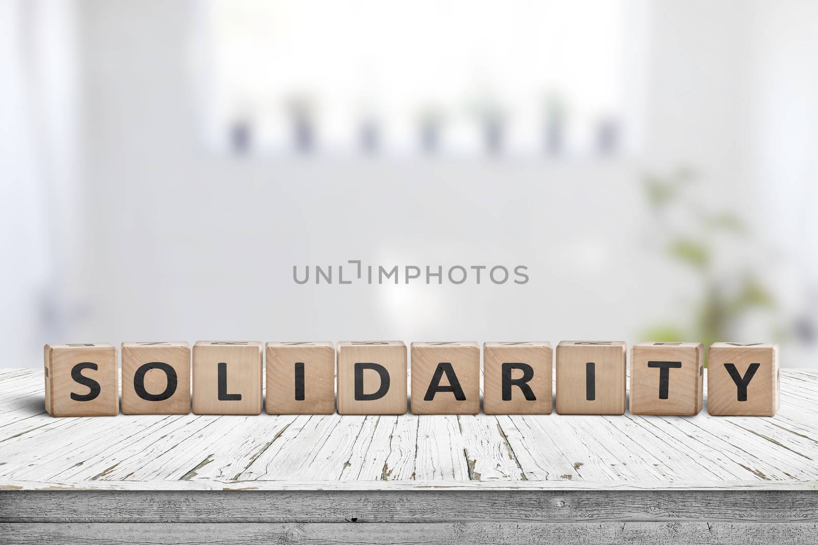 Solidarity message on a wooden table by Sportactive