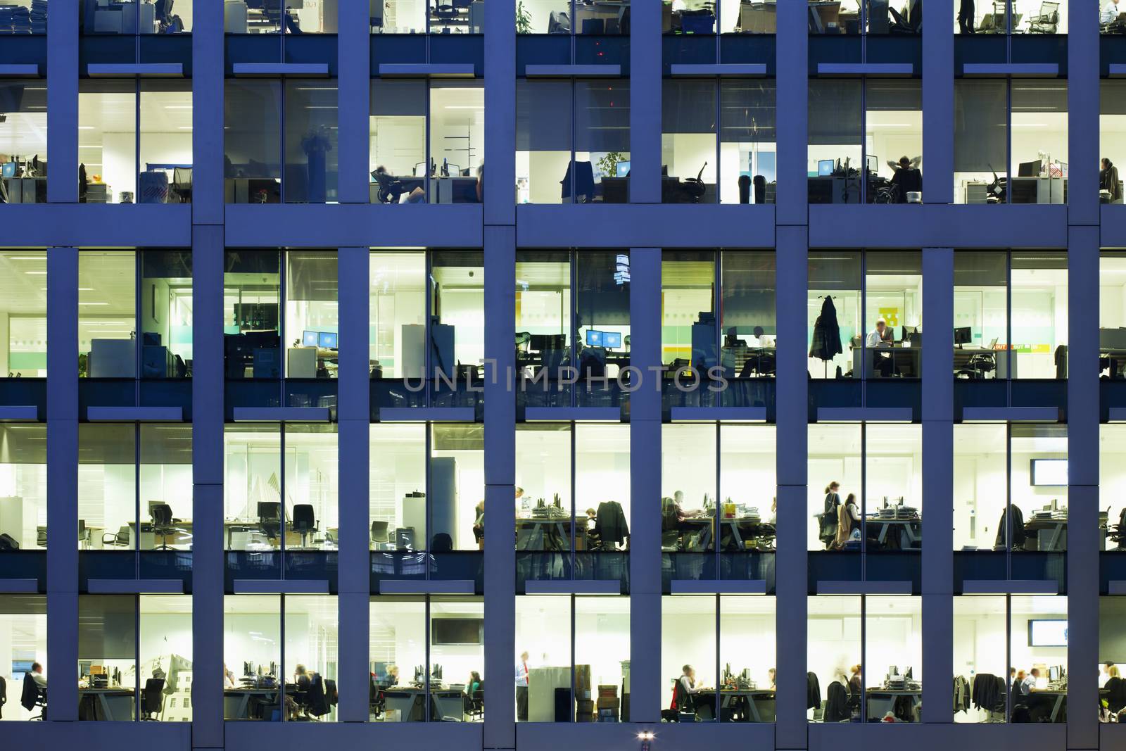 Modern office at night, showing the daily activity of office workers