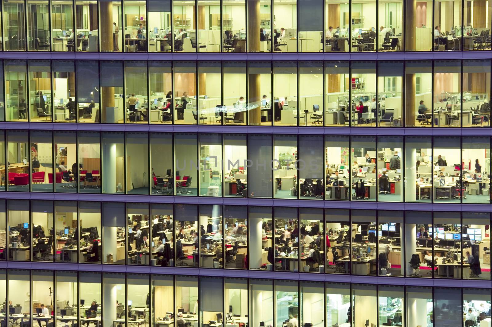 Modern office at night, showing the daily activity of office workers.