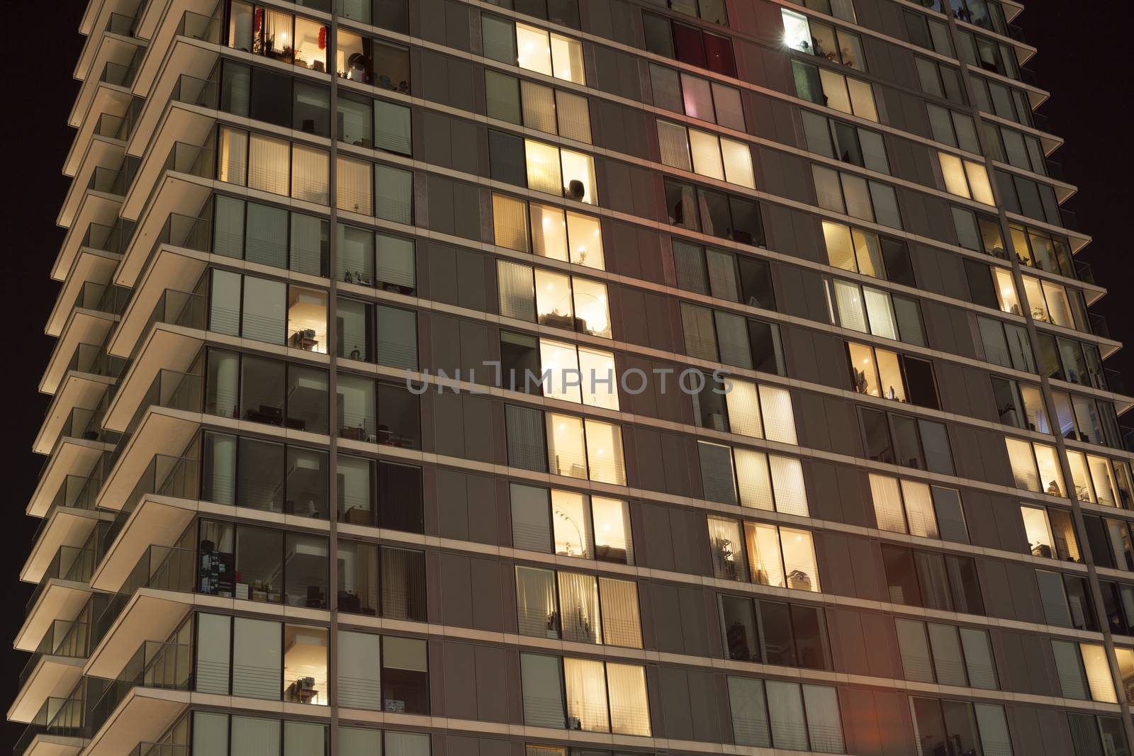 Modern apartment building at dusk