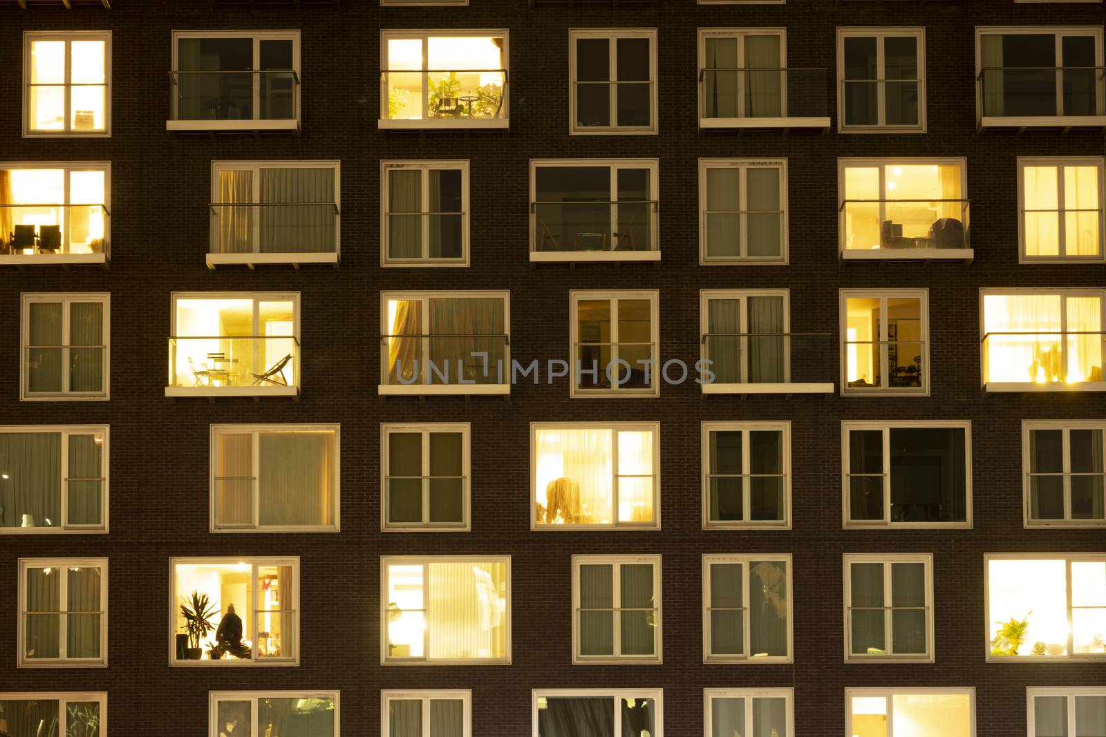 Modern apartment building at dusk