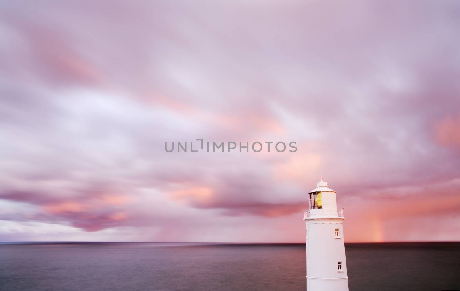 Lighthouse at dawn by conceptualmotion