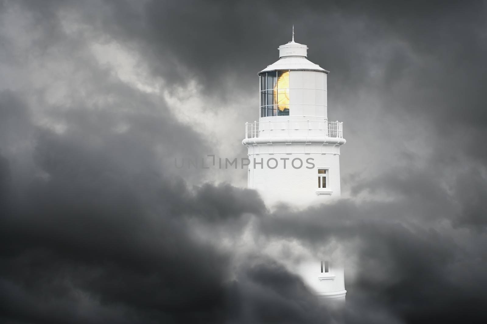 Lighthouse in the clouds by conceptualmotion