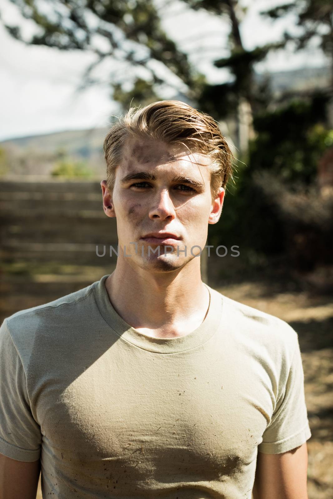 Portrait of soldier standing in boot camp