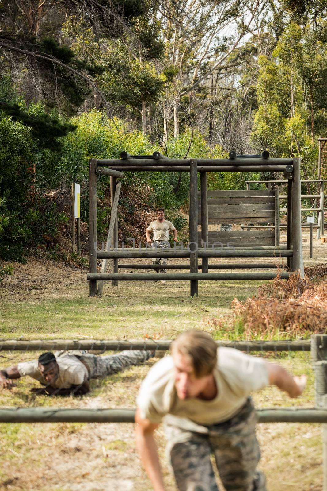 Soldiers training in obstacle course in boot camp