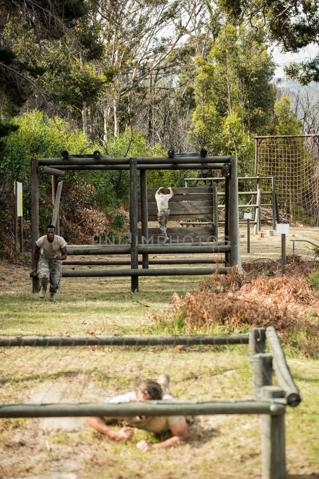 Soldiers training in obstacle course in boot camp