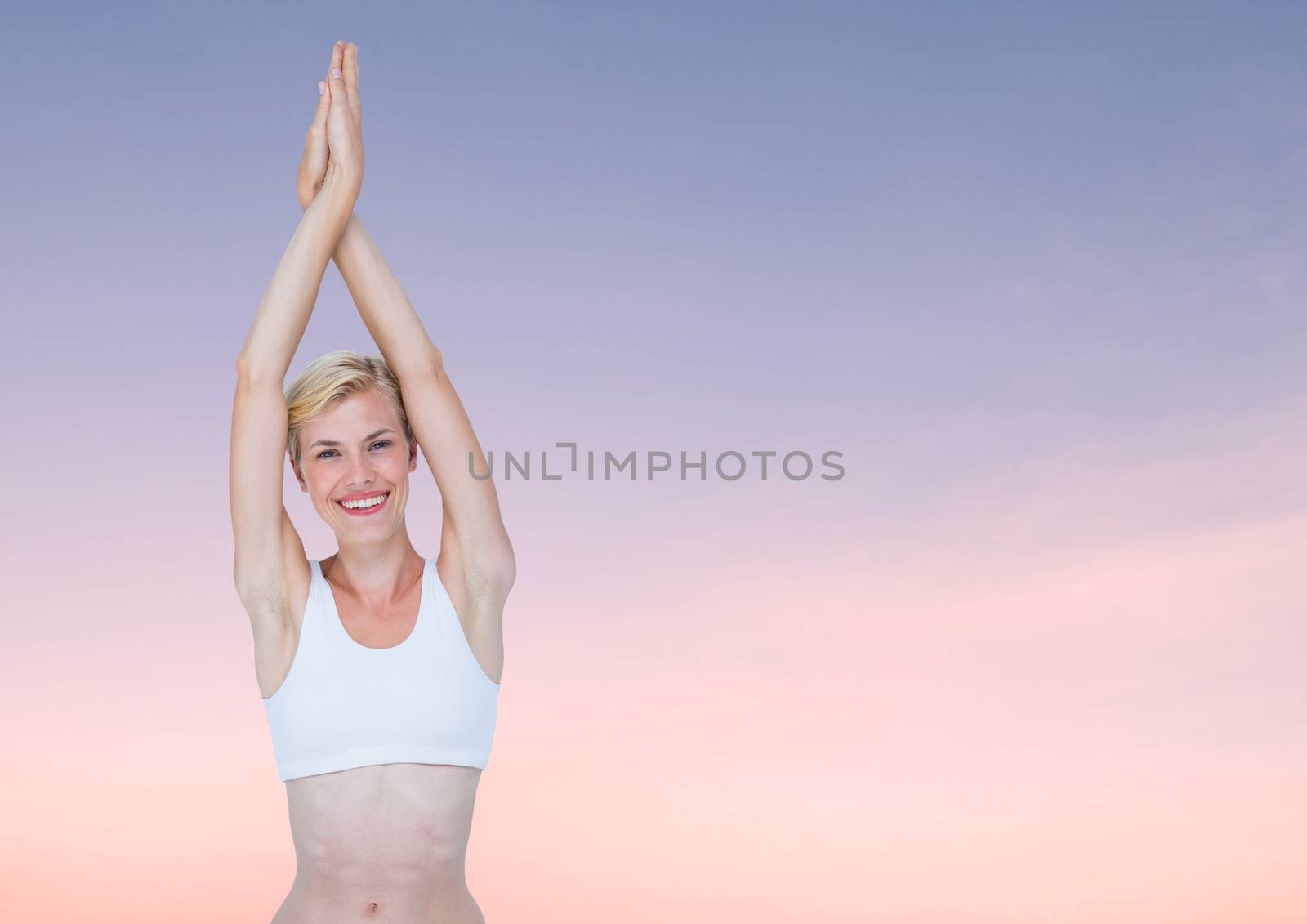 Digital composite of Woman Meditating peacefully yoga in twilight sky