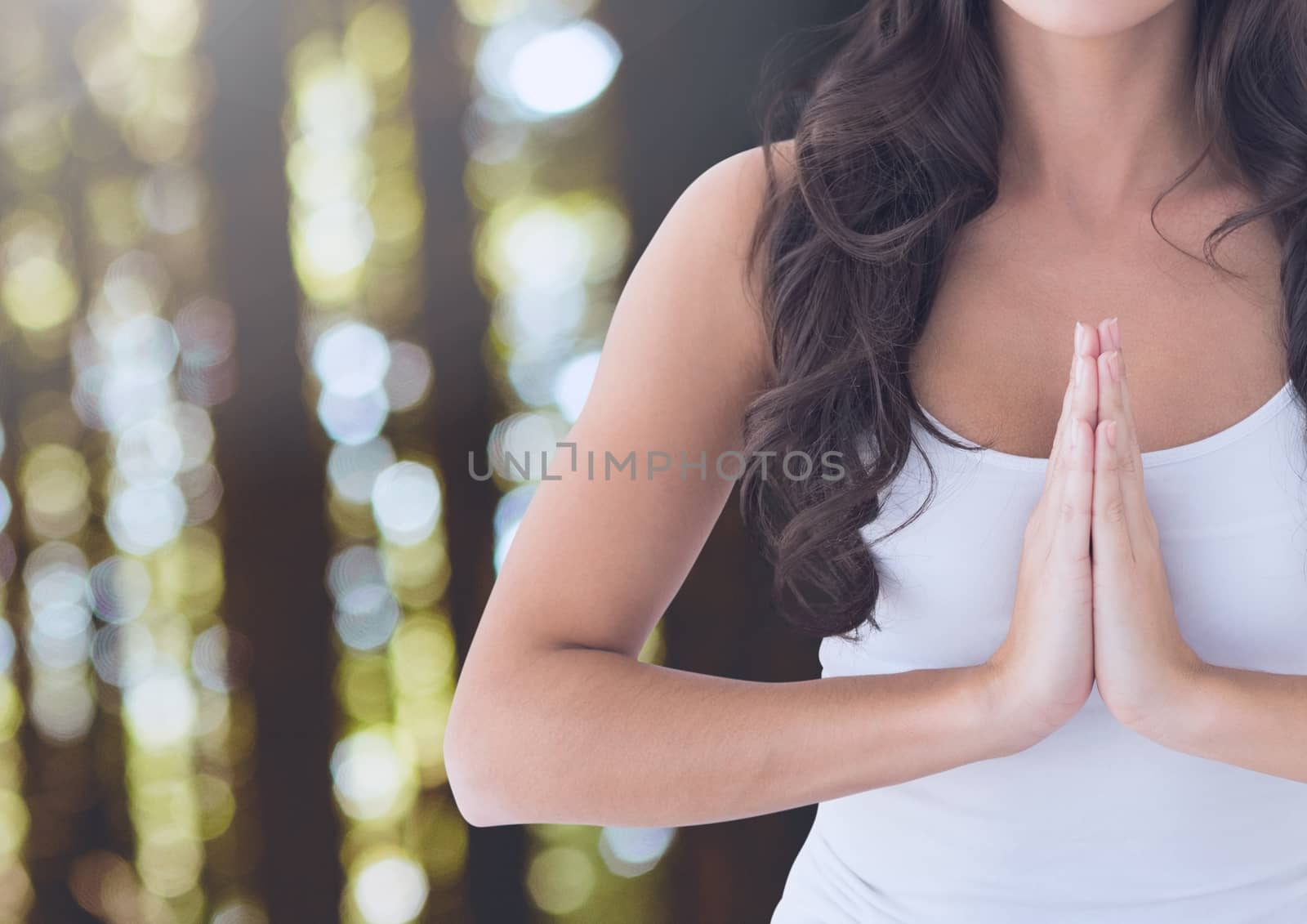 Woman Praying Meditating yoga peaceful in forest by Wavebreakmedia