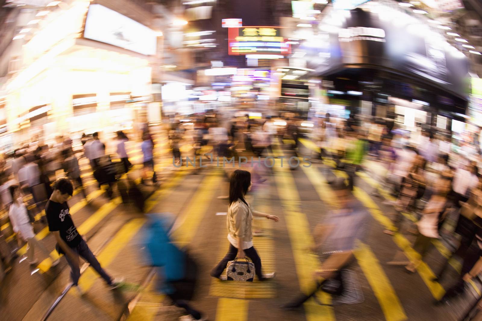 Elevated view of a pedestrian crossing a road in central Hong Kong
China