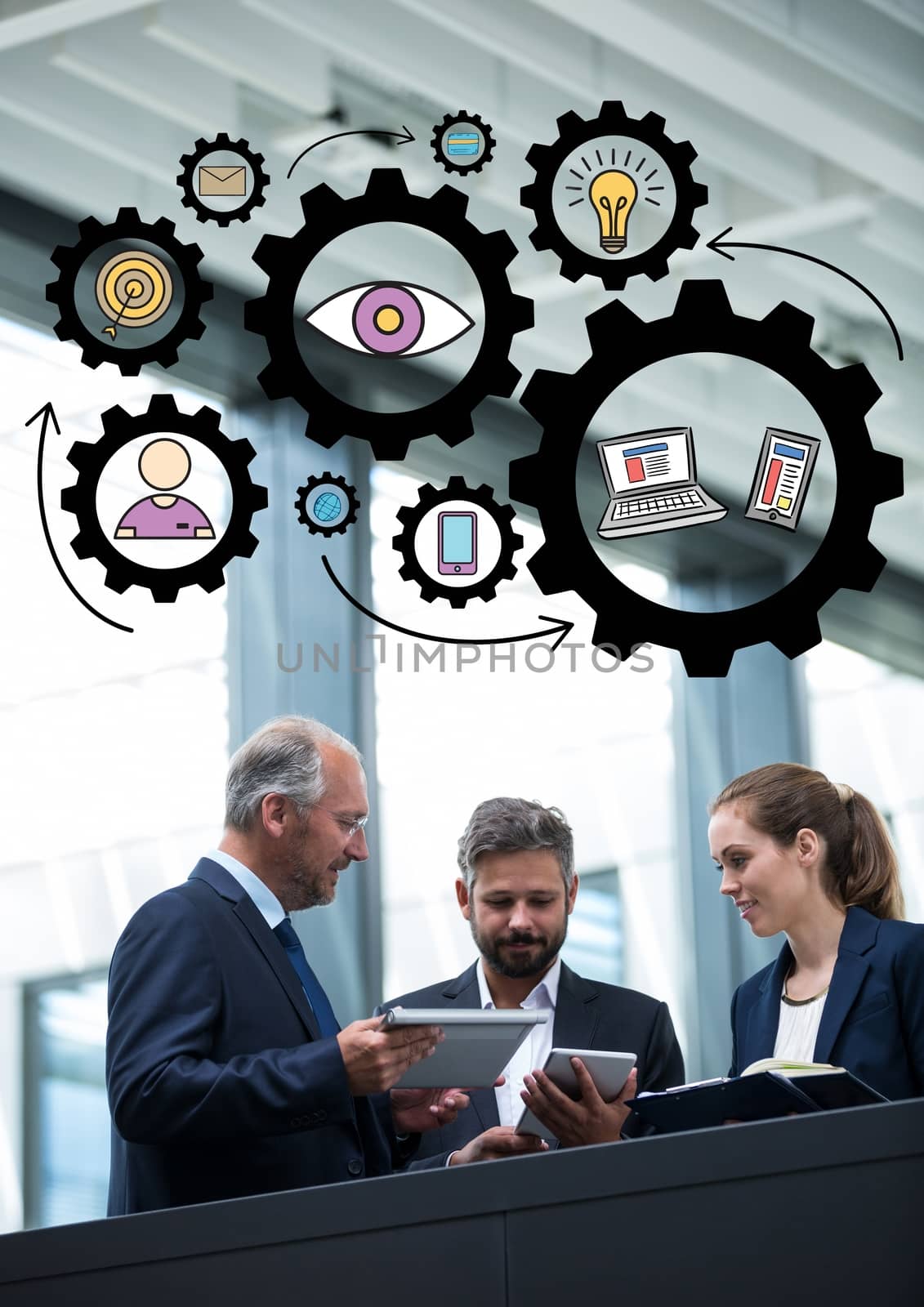 Digital composite of Three business people with devices below black gear graphics