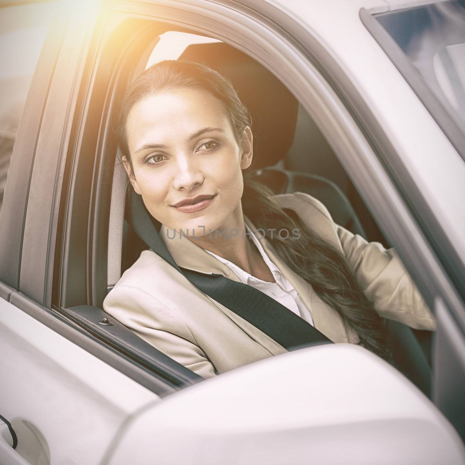 Woman driving and looking away