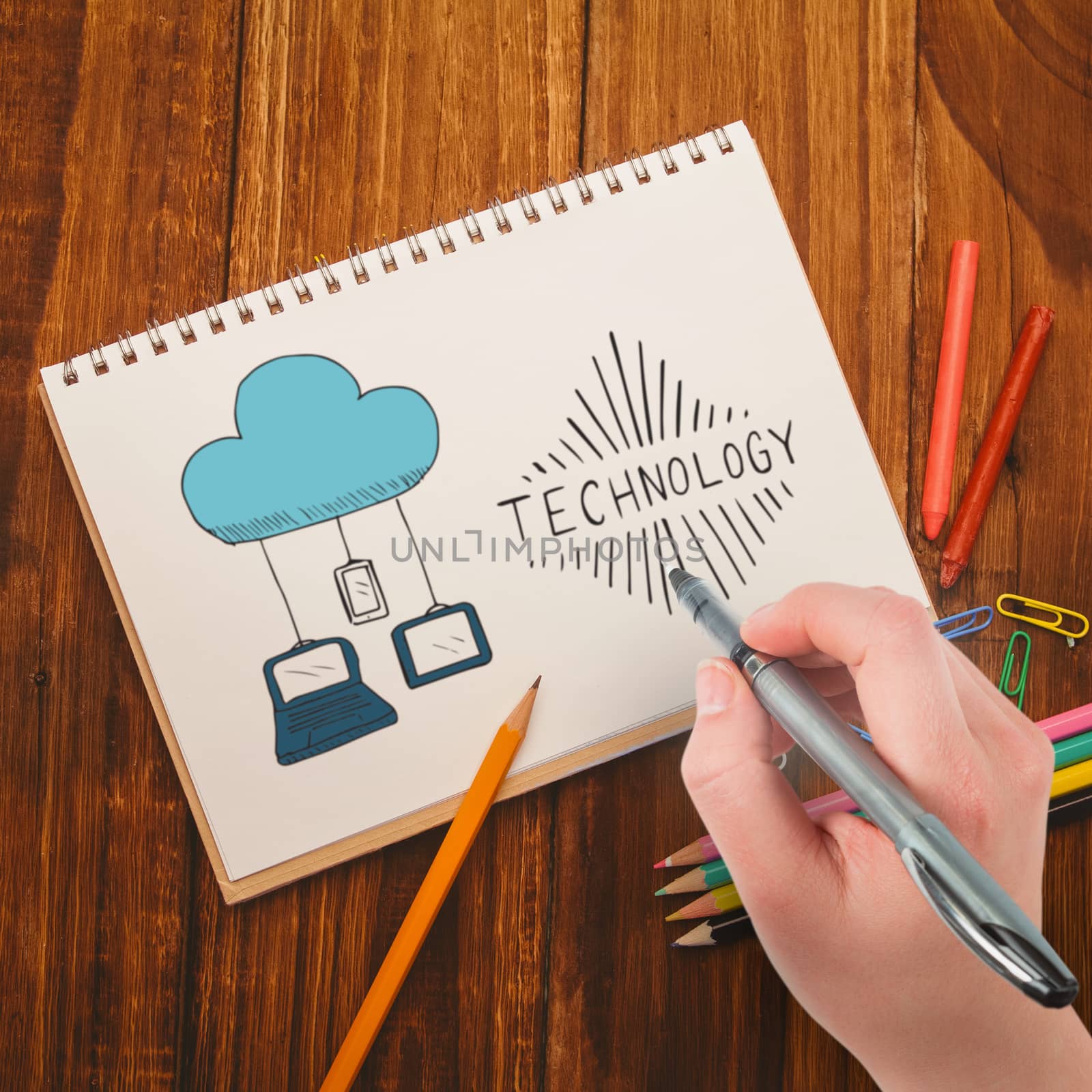 Businesswomans hand writing with pen against notepad on student desk