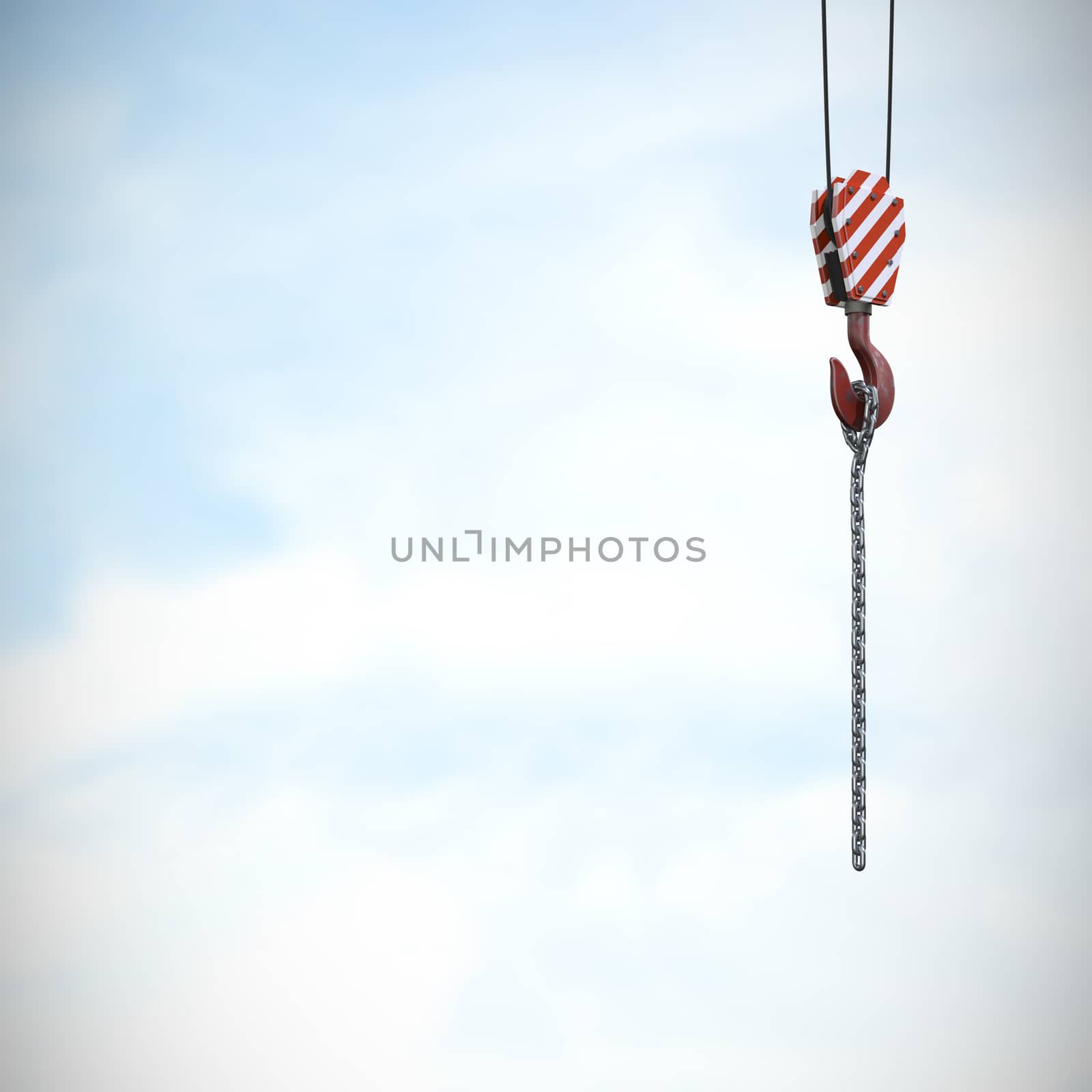 Studio Shoot of a crane lifting hook against blue sky with clouds 