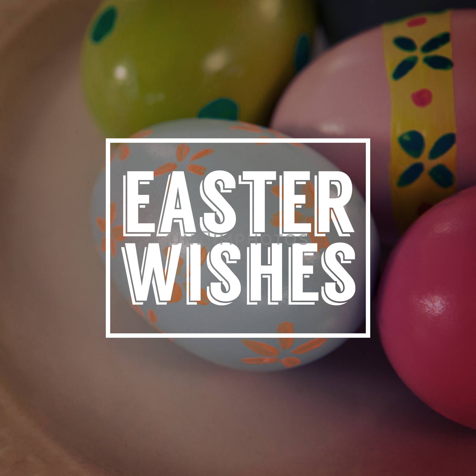 Easter greeting against painted easter eggs on plate