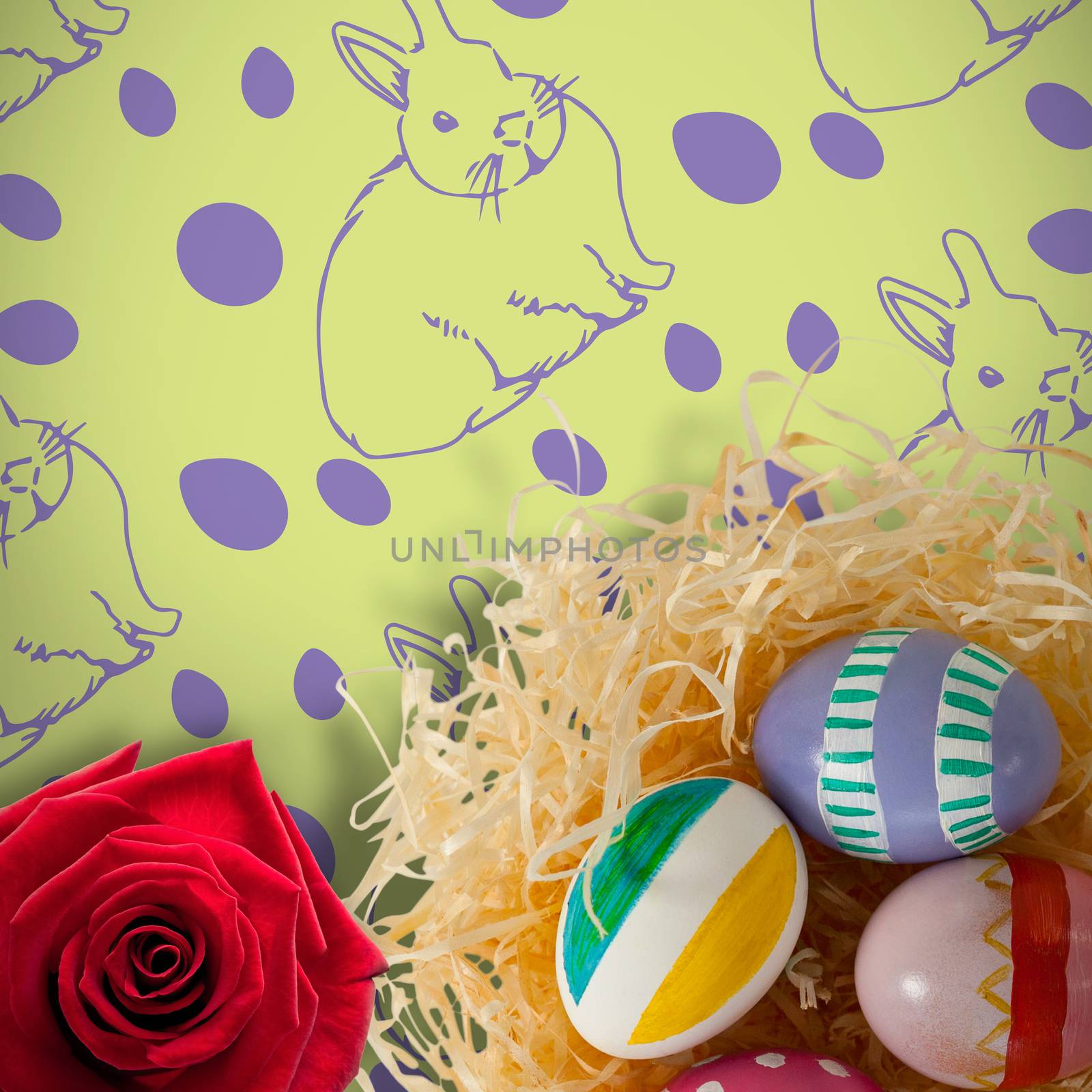 Picture of a rose against multi colored easter eggs on paper nest