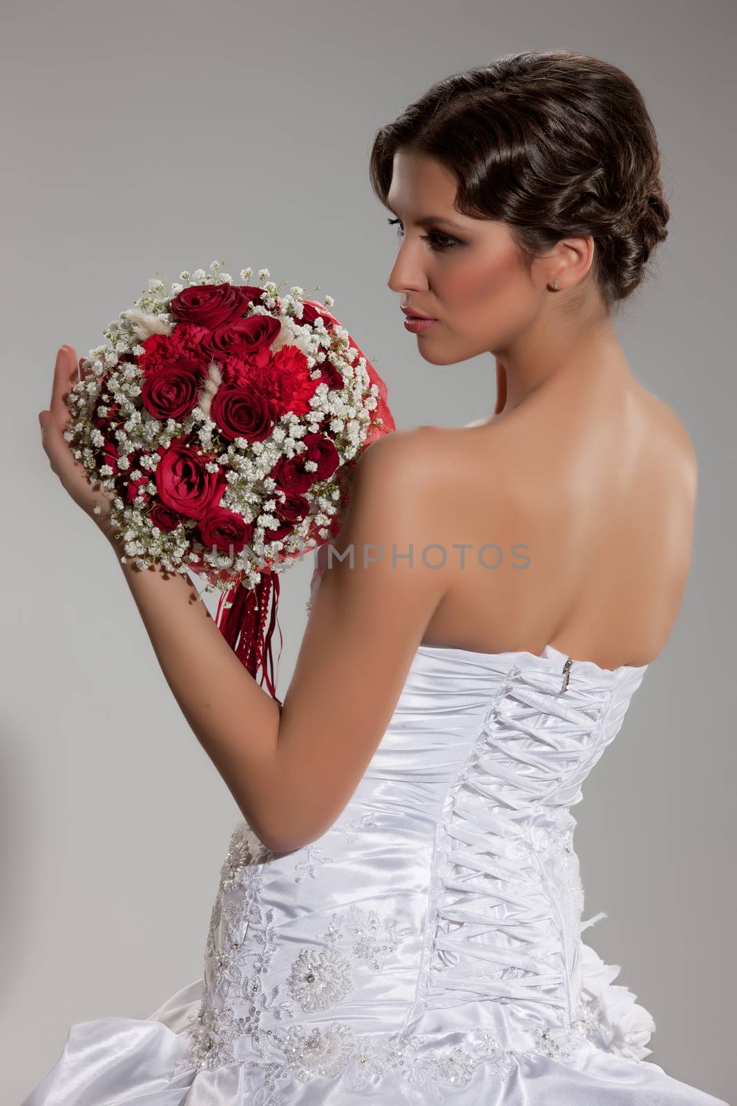 Young beautiful woman in a wedding dress