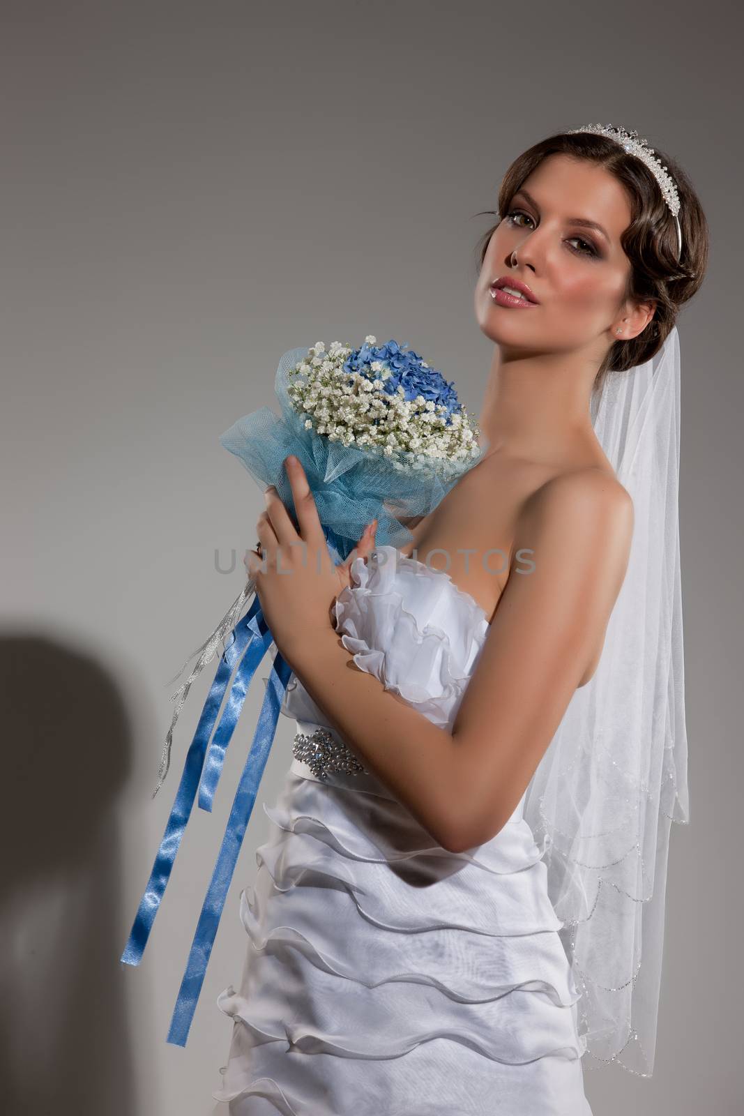 Young beautiful woman in a wedding dress