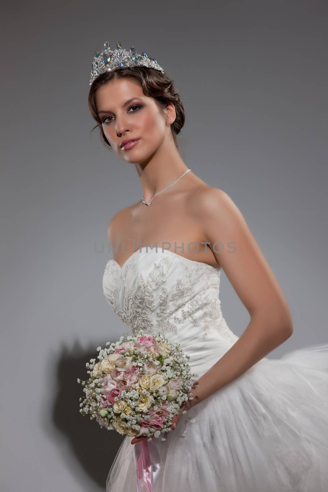 Young beautiful woman in a wedding dress