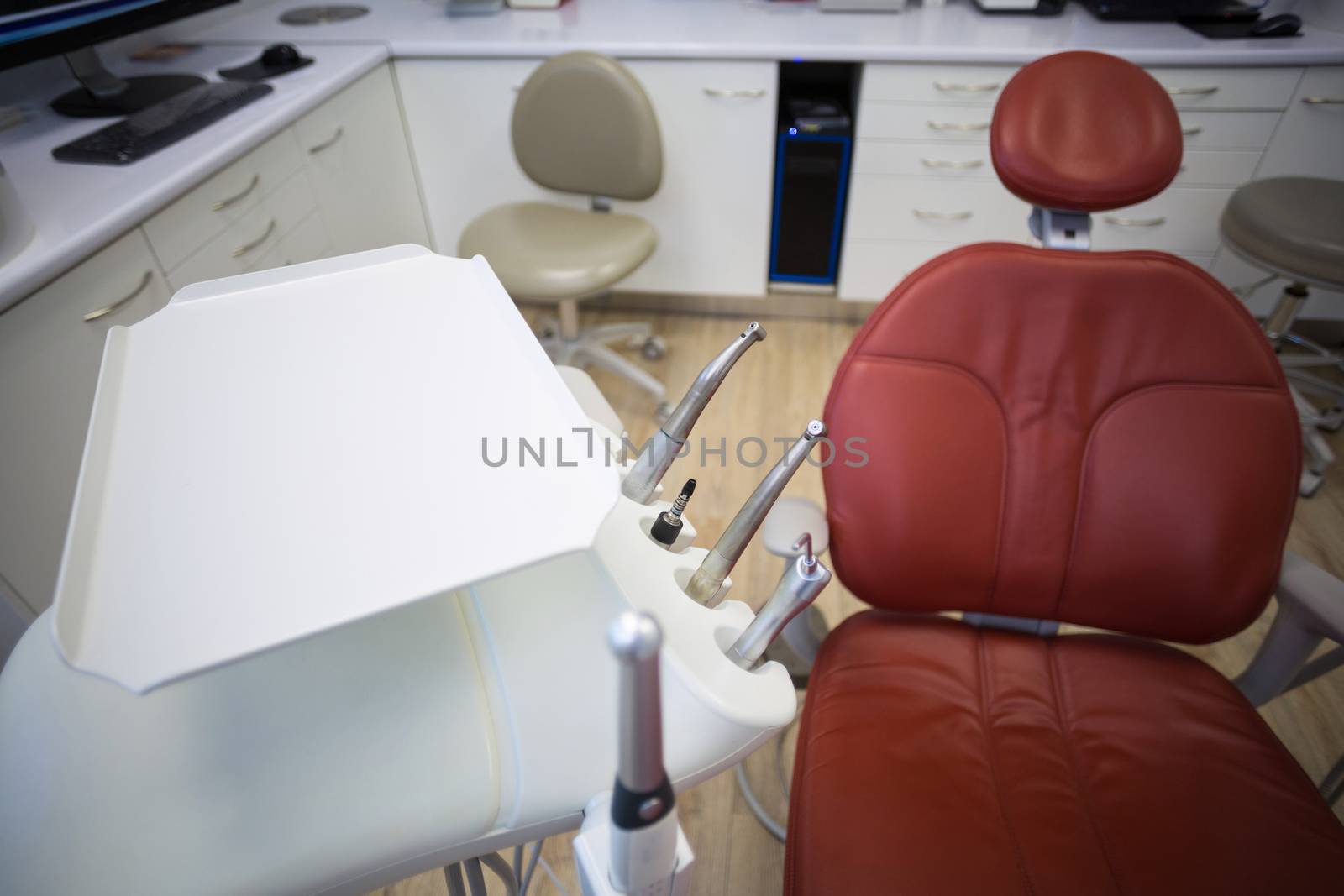 Professional dentistry chair and dentist tools in clinic