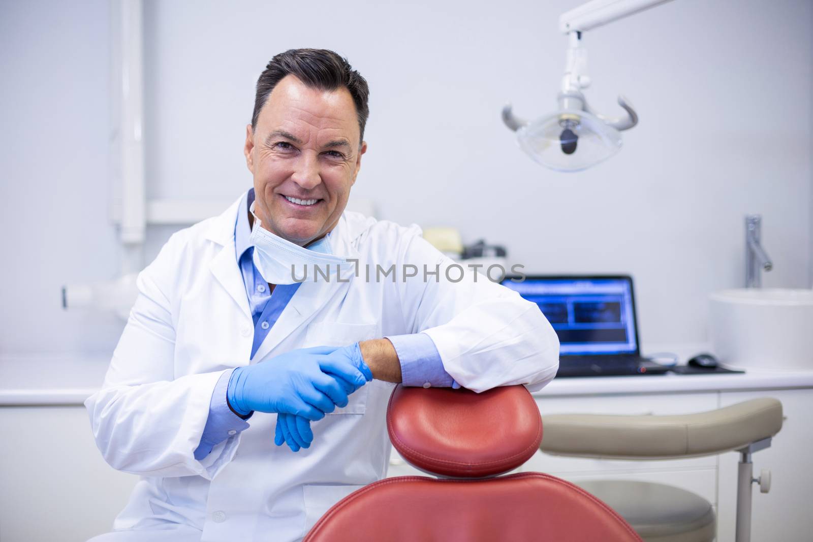 Portrait of smiling dentist by Wavebreakmedia