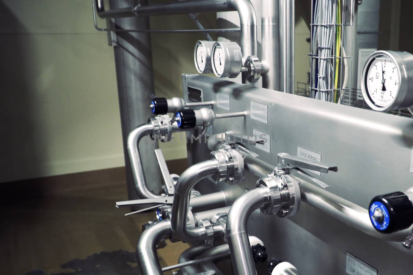 Small brewery. Equipment for brewing beer. Stainless steel on brewing equipment.