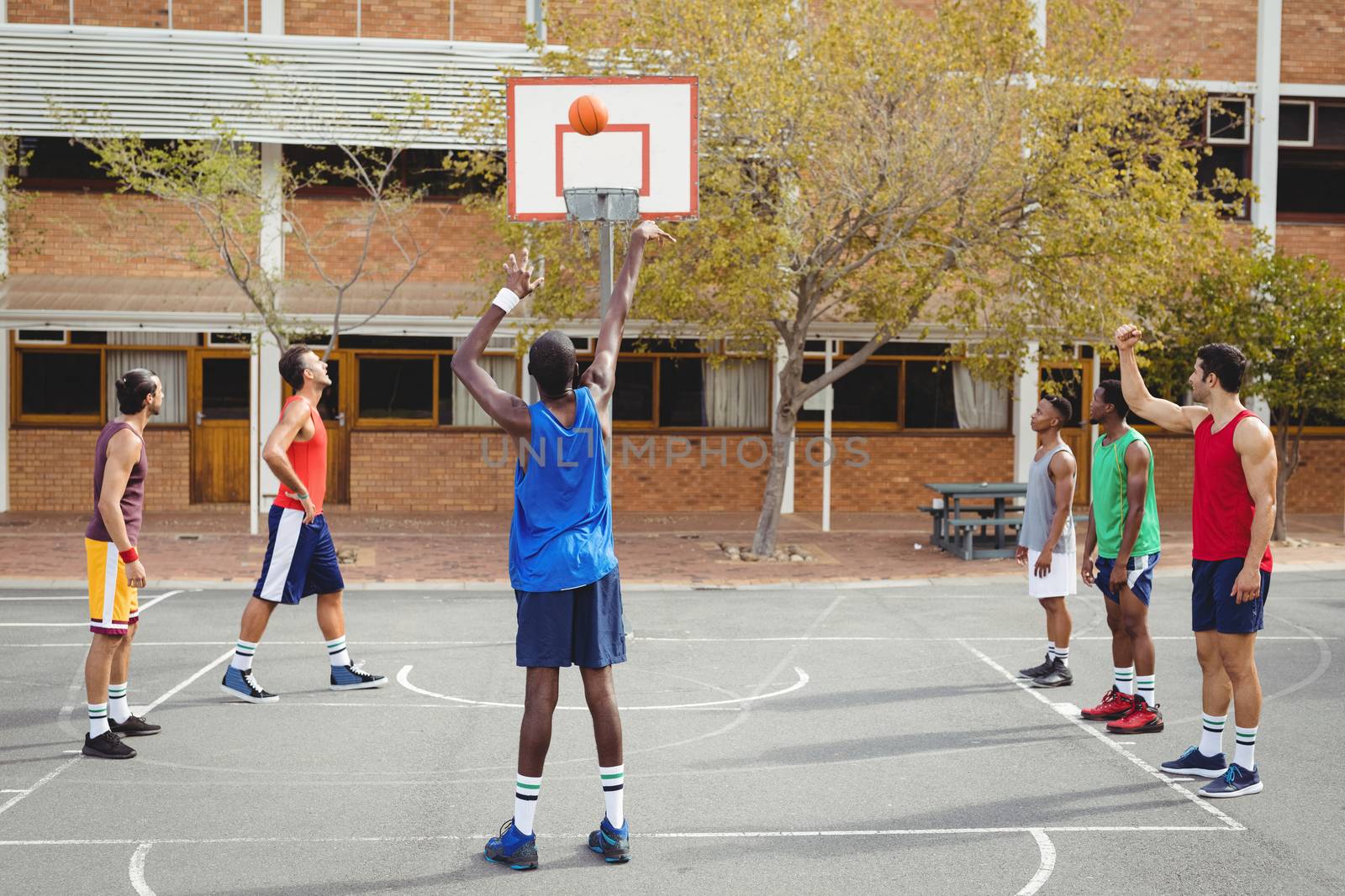 Basketball player taking a penalty shot by Wavebreakmedia