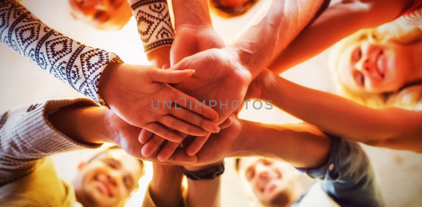 Business people stacking hands by Wavebreakmedia