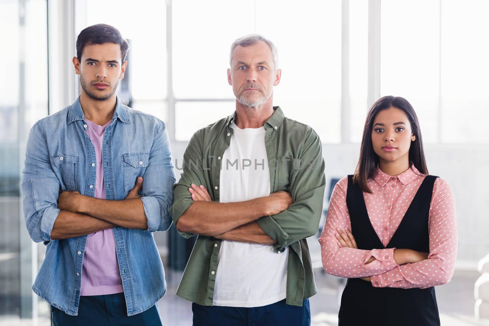 Portrait of confident business people standing in office