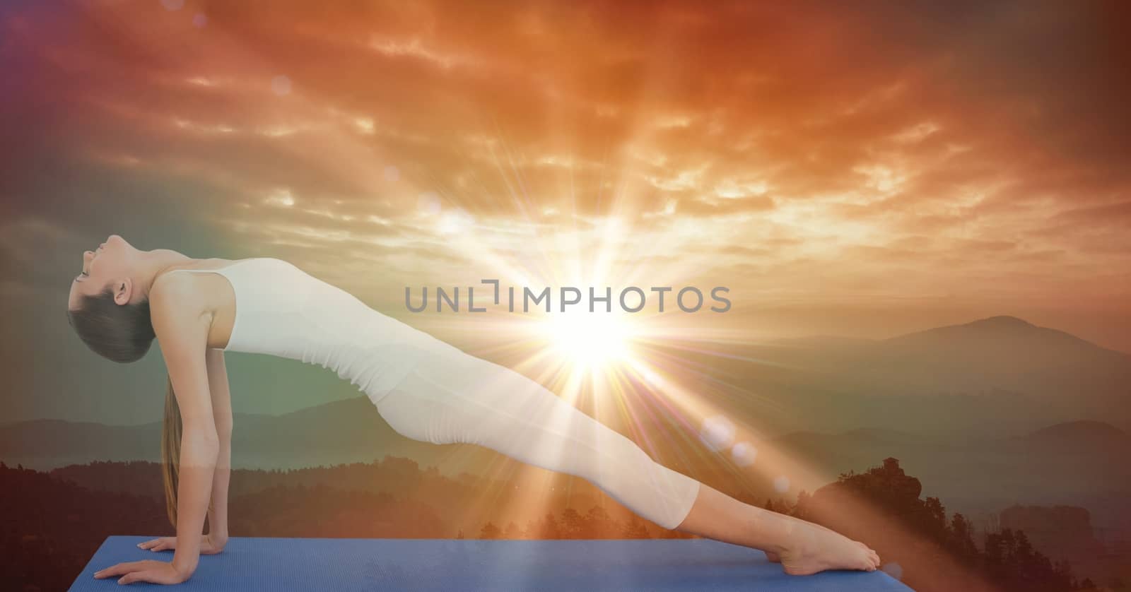 Digital composite of Side view of flexible woman performing yoga during sunset