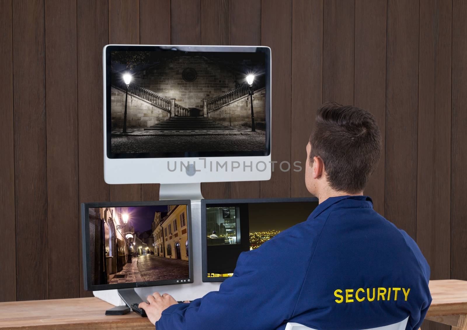 Digital composite of security guard with his technology