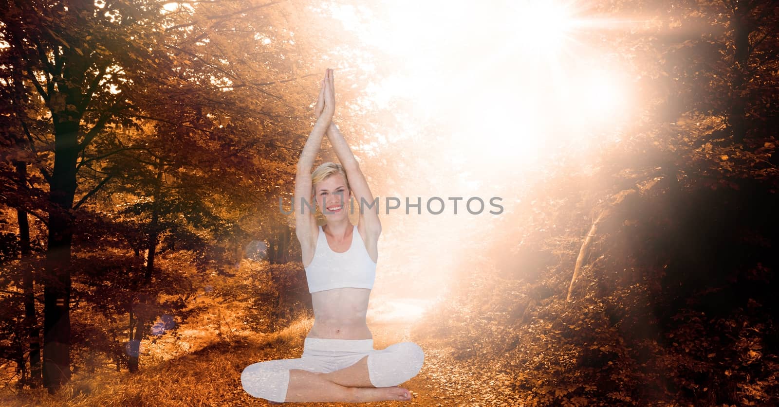 Digital composite of Double exposure of woman with hands clasped doing yoga in forest