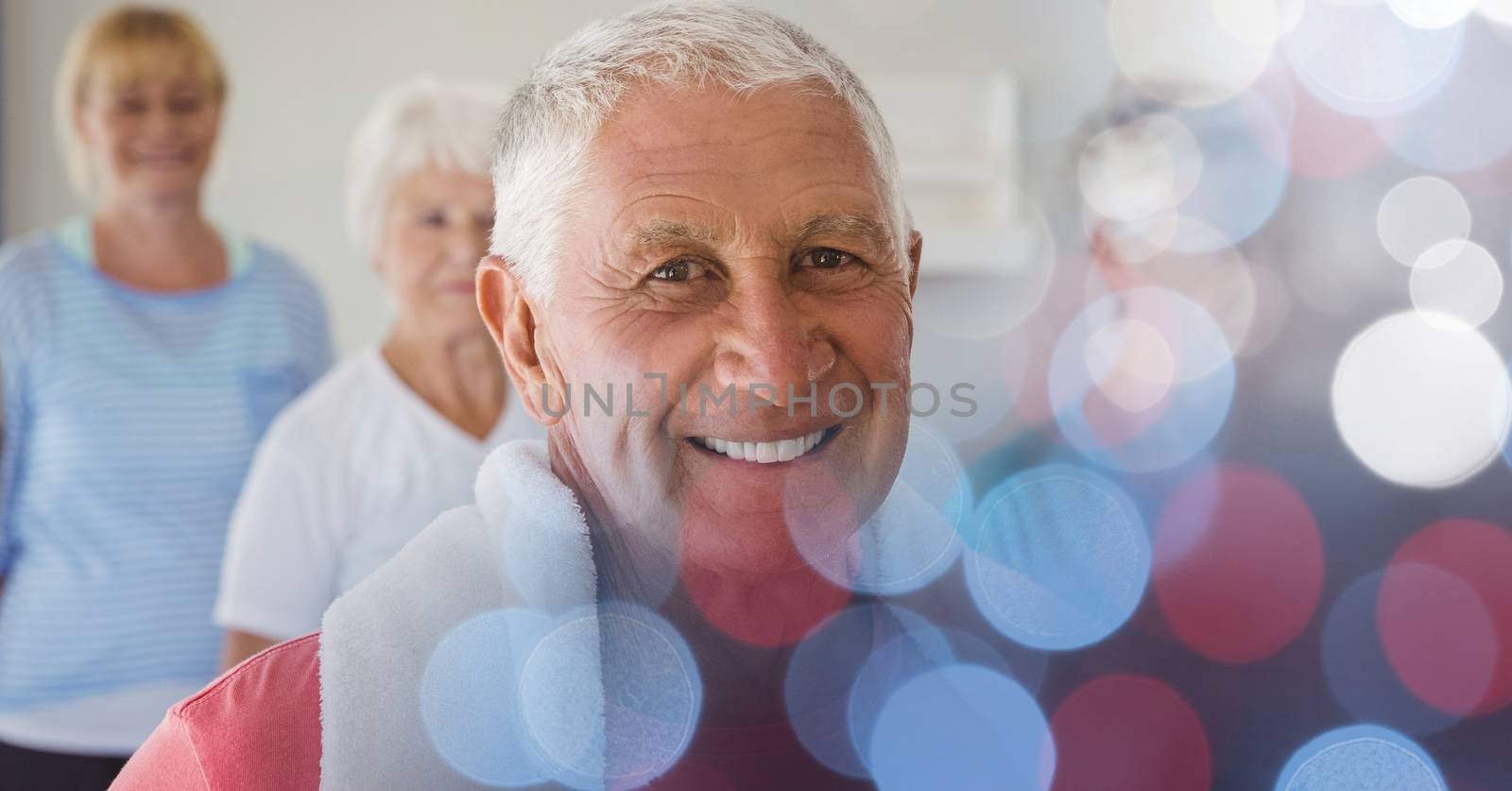 Digital composite of Smiling senior man with friends in yoga class