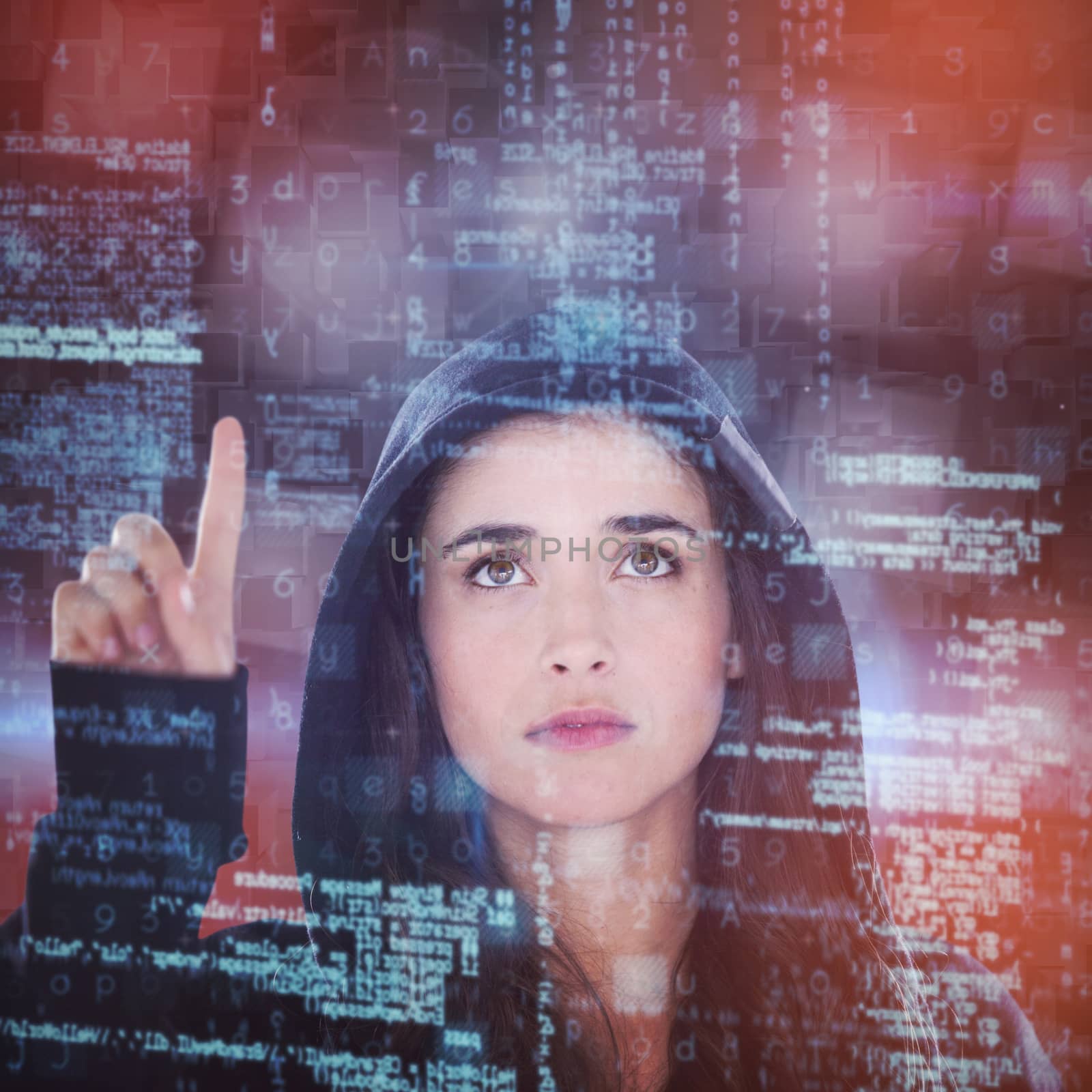 Young female hacker using digital screen against overhead view of blocks