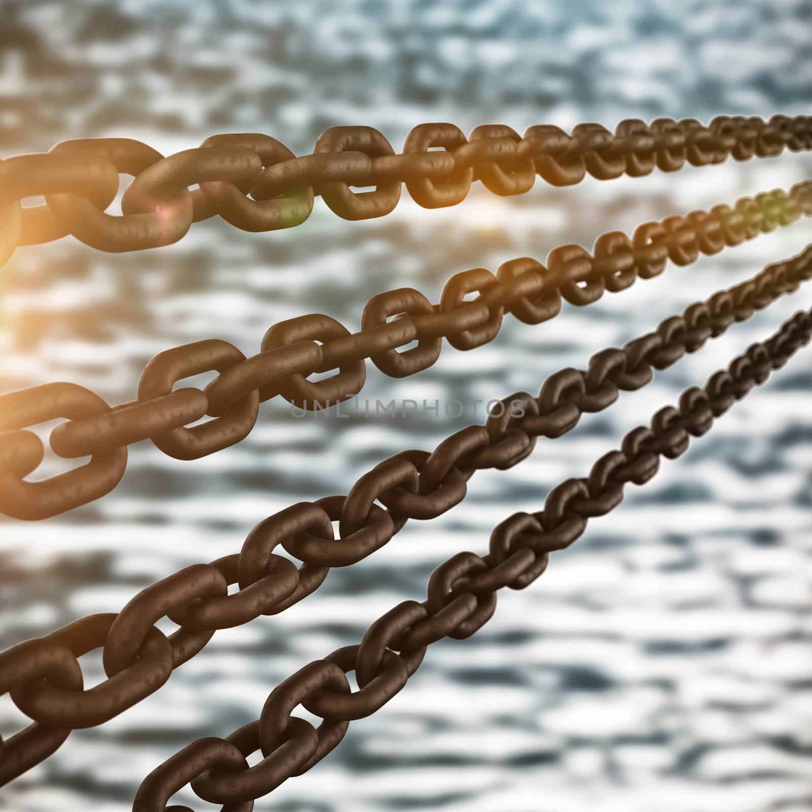 Row of 3d rusty metal chains  against view of river and forest