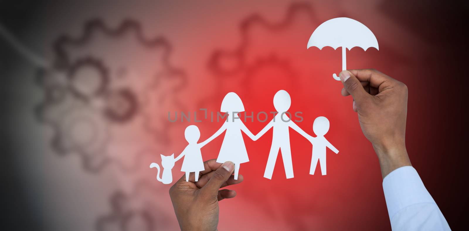 hand holding an umbrella and a family in paper against arrows with gears 