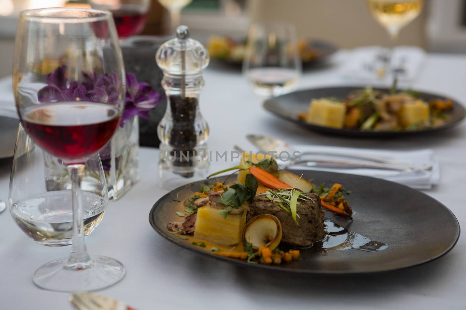 Food and drink served on table by Wavebreakmedia