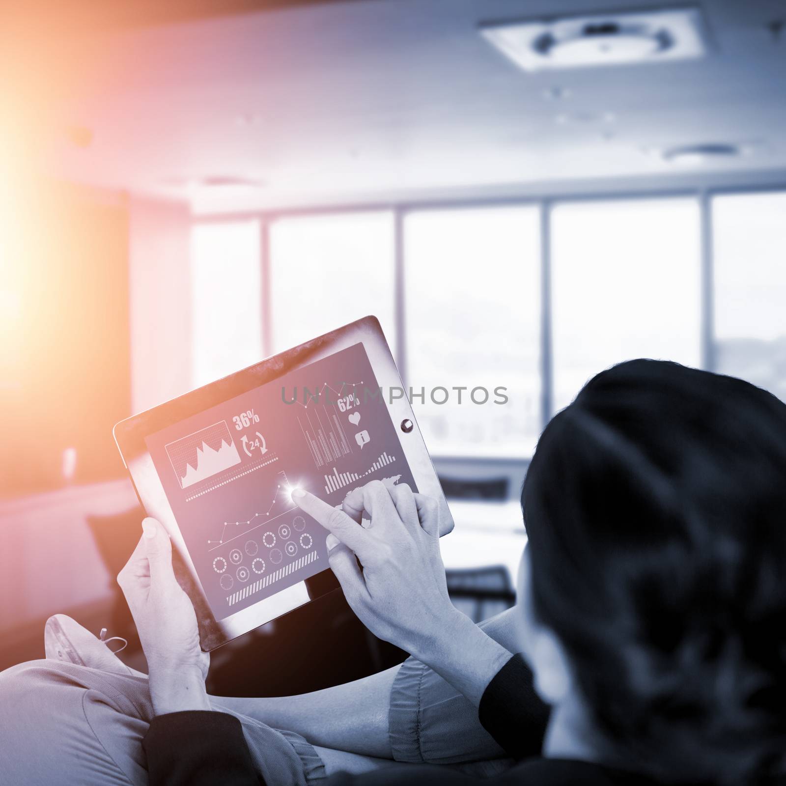 Businesswoman using digital tablet on white background against empty boardroom in office