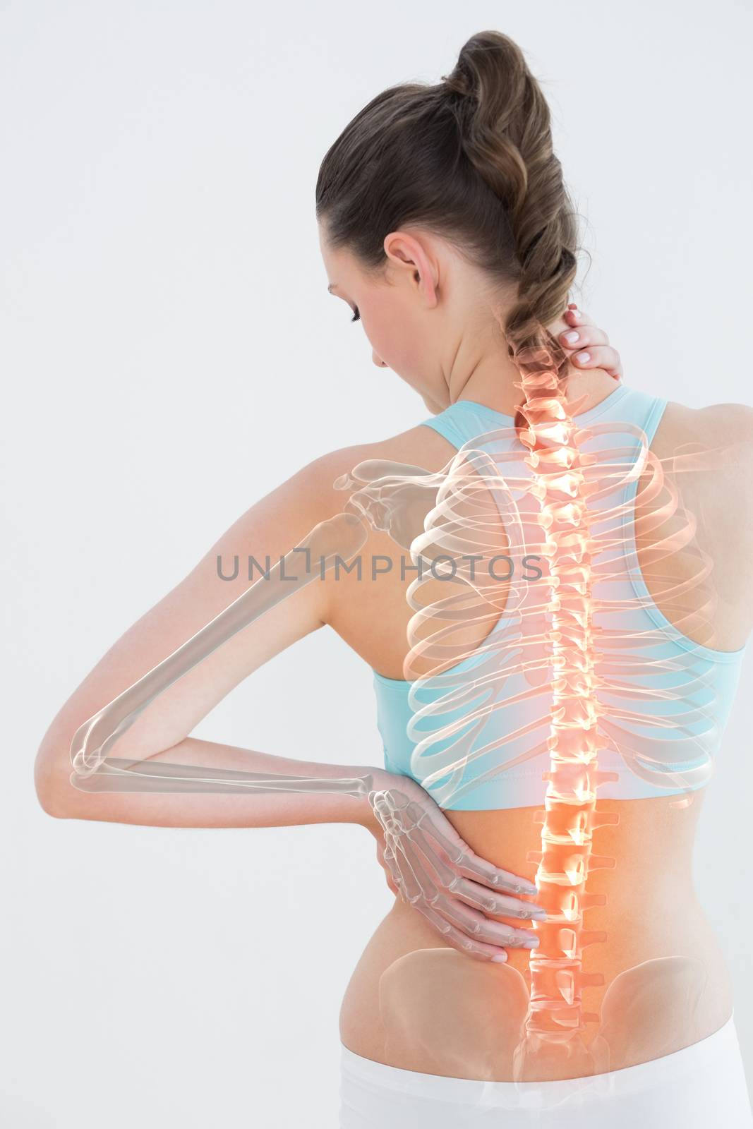 Digitally generated image of female suffering from muscle pain by Wavebreakmedia