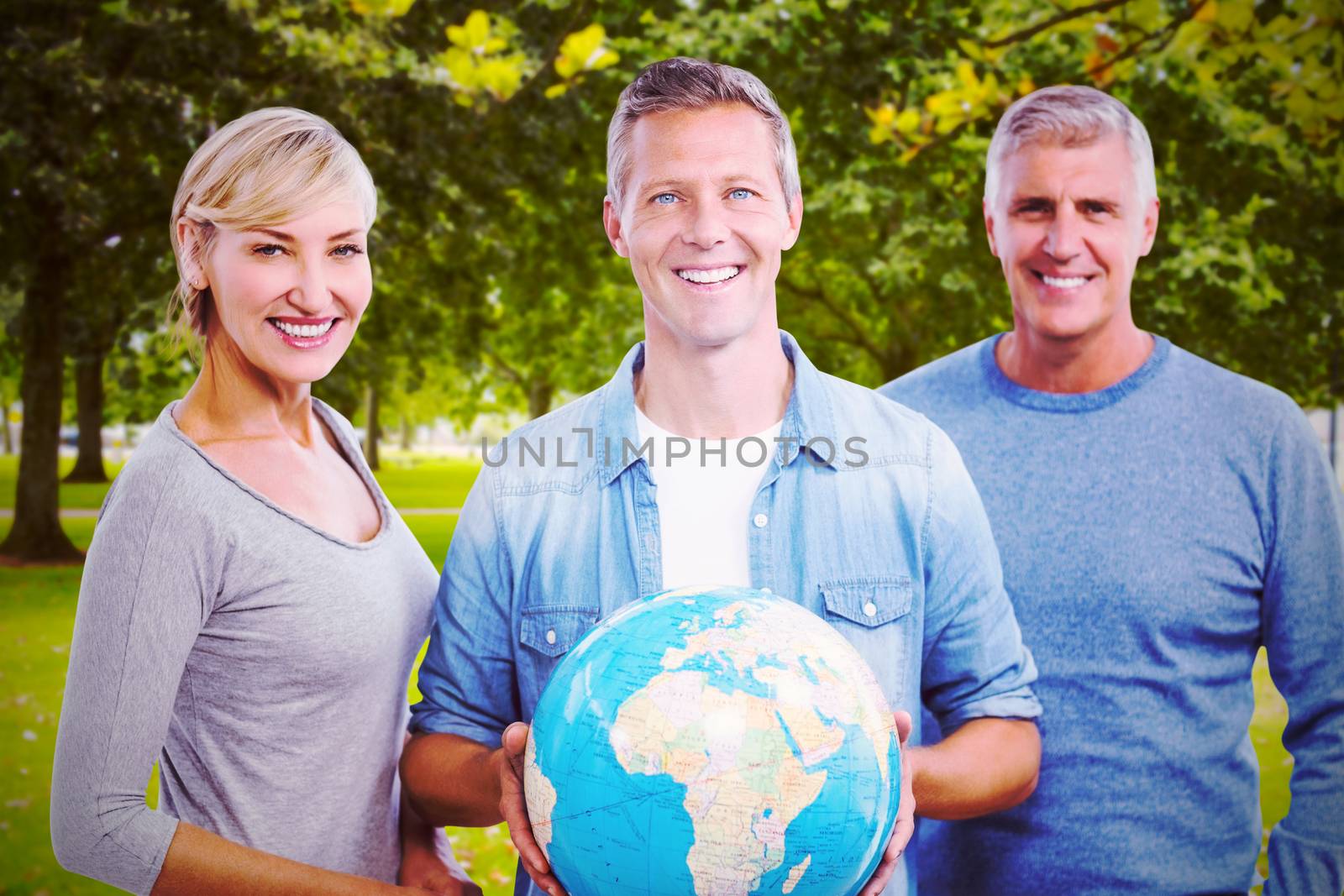 Composite image of portrait of people with globe  by Wavebreakmedia