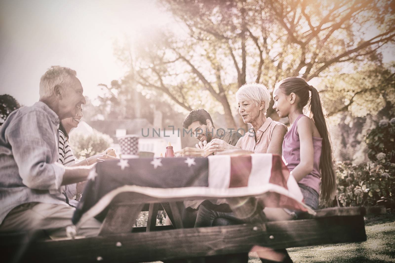 Happy family having a picnic by Wavebreakmedia