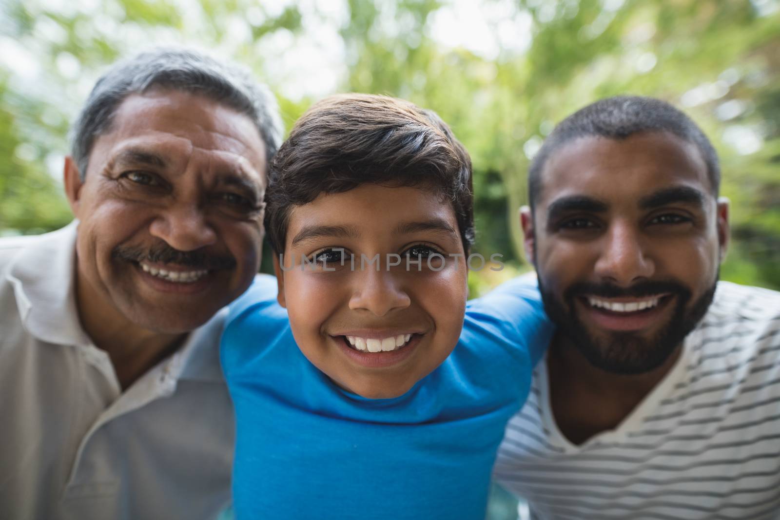 Portrait of smiling multi-generation family by Wavebreakmedia