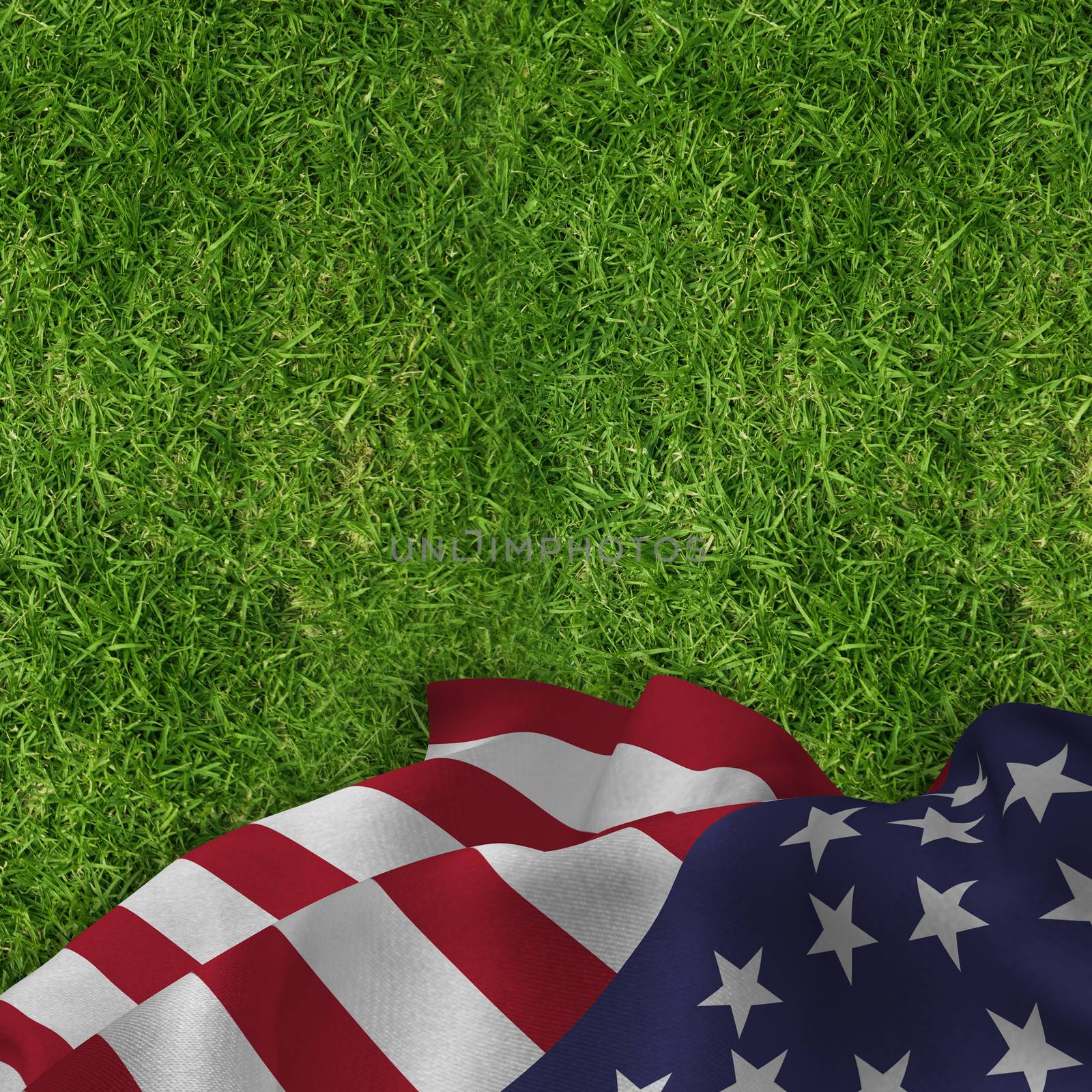 Close up of the us flag against closed up view of grass
