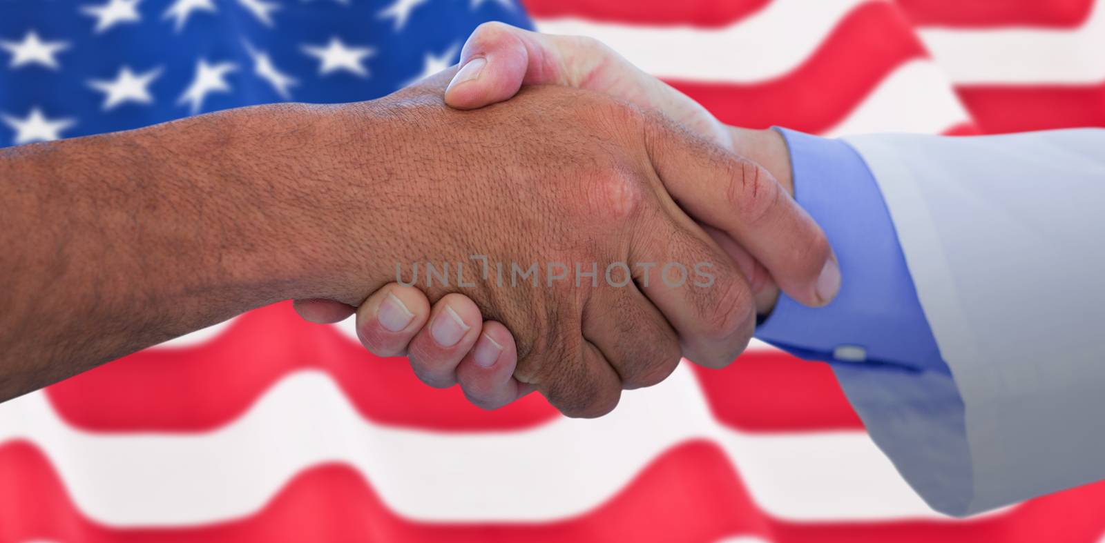 Business people shaking hands on white background against rippled us flag