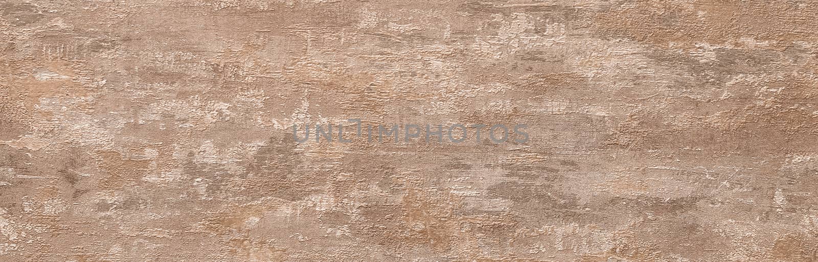 Taupe abstract grungy decorative texture. Textured paper with copy space. Motley brown paper surface, texture closeup.